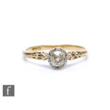 An 18ct illusion set diamond solitaire ring, old cut stone, weight approximately 0.50ct, colour M/N,