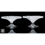 A pair of late 19th Century Stourbridge clear crystal tazzas, possibly Stevens & Williams, of footed