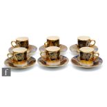 A boxed Soho Pottery Ambassador Ware set of six coffee cans and saucers each decorated with a