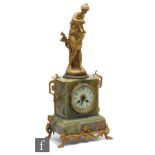 An early 20th Century French gilt and onyx mantle clock, eight day striking movement, mounted with a