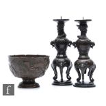 A collection of Japanese metalwares, to include a pair of pricket type candlesticks, the circular