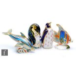 Four Royal Crown Derby paperweights comprising Pacific Angel Fish, numbered 311 of 2500, a