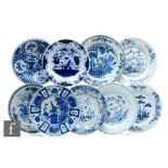 Nine assorted 19th Century English and Chinese tin glazed Delft plates, each with a hand painted