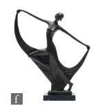 An Art Deco style bronze figure of a female dancer, raised on a black marble base, height 33cm.