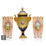 An early 20th Century Coalport pedestal vase and cover decorated with a small cartouche panel