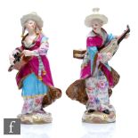 A pair of 19th Century Meissen figures modelled as Malabar Musicians, after the 18th Century