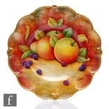 A Caverswall cabinet plate decorated by Millor with a hand painted apple, pear and blackberries, the