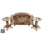 An French Art Deco coloured marble clock garniture with eight day movement striking on a bell oval