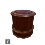 A Victorian mahogany carpet top circular commode with ceramic liner over louvered sides, height