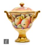 A Coalport twin handled vase and cover decorated by P Worsdale with hand painted apples, pears and