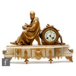 A late 19th Century French gilt mantle clock, mounted with a scholar holding a sphere next to an