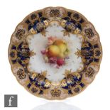 An early 20th Century Royal Worcester cabinet plate decorated by Coles with hand painted pears and