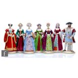 A set of Sitzendorf models of Henry VIII and his six wives, each titled to the backs, each with