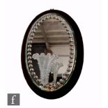 A pair of large 19th Century Stourbridge crystal glass girondale wall mirrors with oval mirror