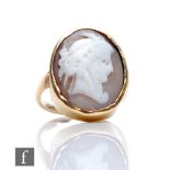 A 9ct cameo ring, profile of a classical woman, weight 5.7g, length 3cm, ring size P, damaged.