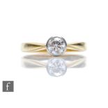 An 18ct hallmarked diamond solitaire ring, brilliant cut collar set stones, weight approximately 0.