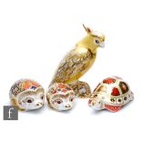 Four Royal Crown Derby paperweights comprising a Citron Cockatoo, two hedgehogs named Bramble and