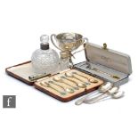 A parcel lot of assorted hallmarked silver items to include a set of six enamelled tea spoons, a