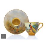 An early 20th Century matched Royal Worcester cabinet coffee cup and saucer decorated by Stinton and