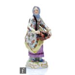 A 19th Century Meissen Street Trader figure from the Cris de Paris series modelled as the Hurdy