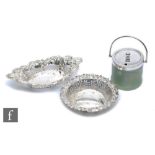 Two hallmarked silver pierced and embossed bon bon dishes, total weight 5oz, with a silver plated