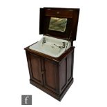 A London and North Eastern Railway (LNER) mahogany vanity sink unit from a sleeper carriage, the