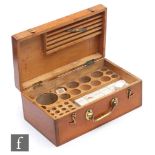 A second quarter 20th Century wooden geologist's chest, with fitted interior containing a number