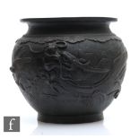 A Japanese Meiji Period (1868-1912) bronze jardiniere, of rounded form, relief cast with birds and