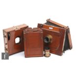A 19th Century Lancaster & Son, Birmingham, mahogany bellows plate camera, four double dark
