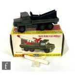 A Dinky 620 Berliet Missile Launcher in drab green including hubs, black plastic launcher, silver