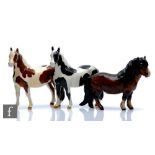 Three Beswick horse comprising two Pinto Pony, model 1373, one Piebald, one Skewbald, both with