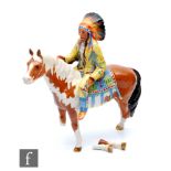 A Beswick Mounted Indian, model 1391, printed crest mark, damaged.