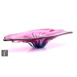 A 20th Century large Chribska glass bowl of organic form with wide pulled rim, all in a graduated