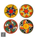 Four Wedgwood Clarice Cliff Bradford Exchange wall plates decorated in Abstract patterns, all with