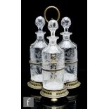 Three late 19th to early 20th Century clear crystal decanters of shouldered cylinder form with facet