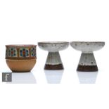 A pair of mid 20th Century Michael Andersen and Sons candlesticks with a wide brim bowl to a