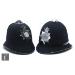 A West Mercia Constabulary blue cloth sectional helmet, height 22cm, and a later Bedfordshire