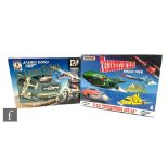 Two Matchbox TV related diecast model sets, Thunderbirds Rescue Pack and James Bond Licence to Kill,