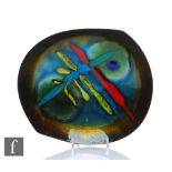 A 1950s enamel dish of abstract form with abstract enamel decoration in red, yellow and blue over