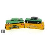 Two Dinky toys diecast model cars, 165 Humber Hawk in two-tone green and black with spun hubs, and