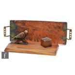 A small Secessionist brass and copper two handled serving tray, width 43cm, and an Art Deco wooden