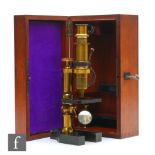 A 19th Century lacquered brass compound microscope by E Hartnack & Prazmowski III-A in fitted