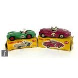 Two Dinky Toys diecast model sports cars, 110 Aston Martin DB3 in mid-green with red interior, red