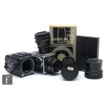 A collection of Hasselblad camera bodies and accessories, to include a 500C/M body serial number