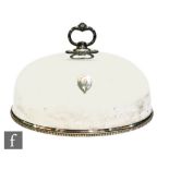 A late 19th to early 20th Century plated oval domed meat cover with acanthus scroll handles and
