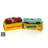 Two Dinky diecast model cars, 108 MG Midget in red including ridged hubs, with brown interior and