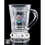 A 19th Century Bohemian clear crystal glass tankard, the petal edged radial cut foot rising to a