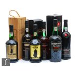 A collection of port, to include two bottles of Sandeman ruby port, a boxed 1987 bottle of Taylor'