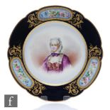 A late 19th to early 20th Century Sevres cabinet plate decorated with a hand painted portrait of