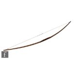 A traditionally constructed ash archer's bow with whipped detail to the grip, length 177cm.